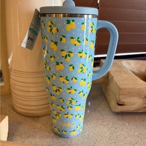 Swig 40oz Lemon Meringue Travel Tumbler (has slight dent)